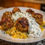 Five perfectly browned greek chicken meatballs served over orzo pasta with a generous topping of creamy tzatziki sauce.